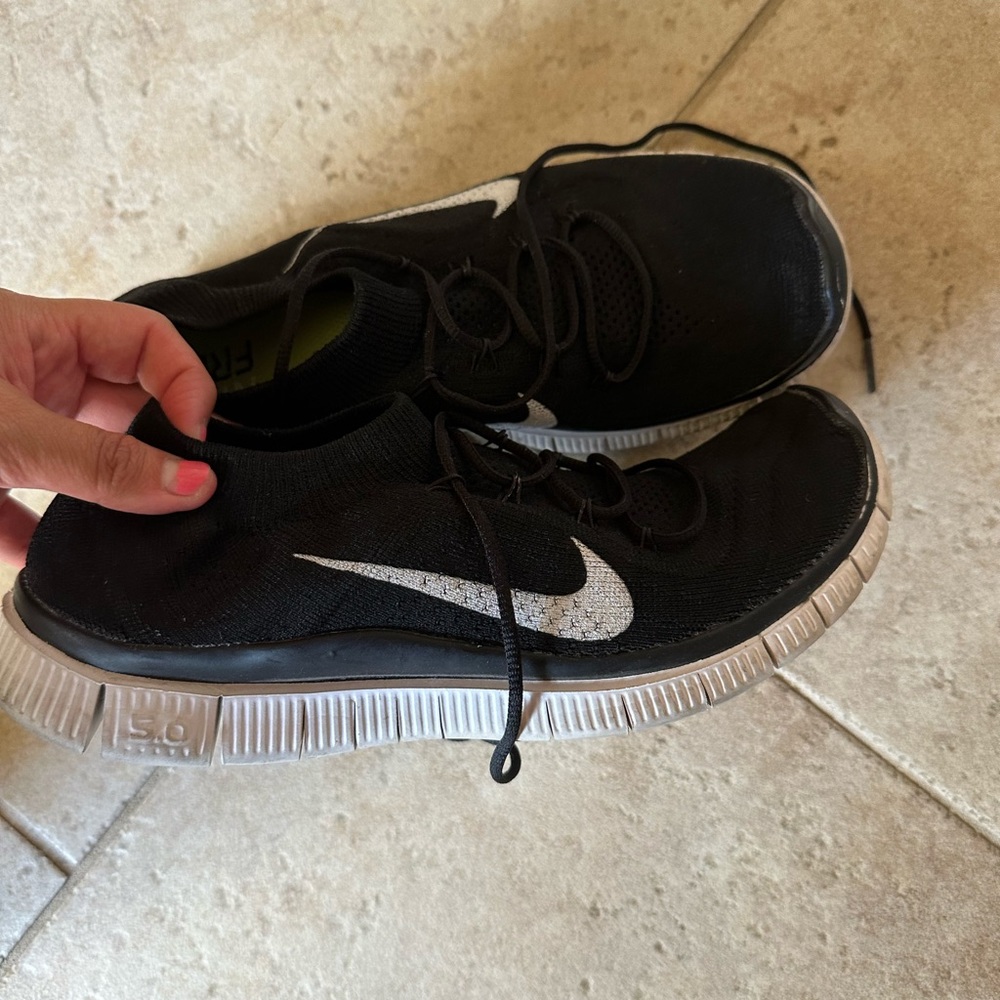 Black Nike running shoes